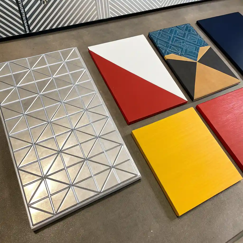 Mixed media examples of modern art wall decor including geometric panels and line art