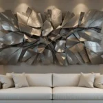 Contemporary living room featuring metal art wall decor above a sofa.