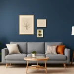 Modern living room with navy blue accent wall and minimalist furniture.