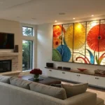 Vibrant glass wall art decor in modern living room."